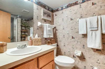 a bathroom with a sink and a toilet at 17 Mi to Columbus Pickerington Home with Fire Pit! in Pickerington