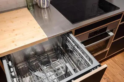 an open dishwasher in a kitchen with a counter at Walk to ALL - Washington Park - FREE Streetcar in Cincinnati