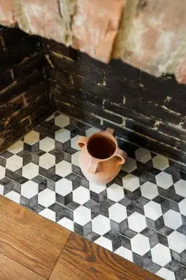 a vase sitting on a black and white checkered floor at Walk to ALL - Washington Park - FREE Streetcar in Cincinnati