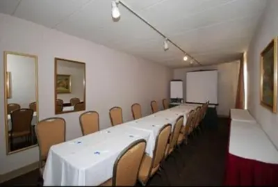 a conference room with a long table and chairs at Quality Inn Chillicothe in Chillicothe