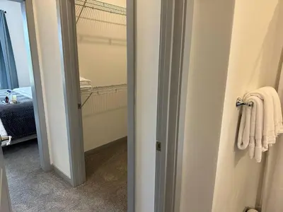 a hallway with a towel hanging on a door at The Dublin Designer 1st Floor Available Now in Dublin