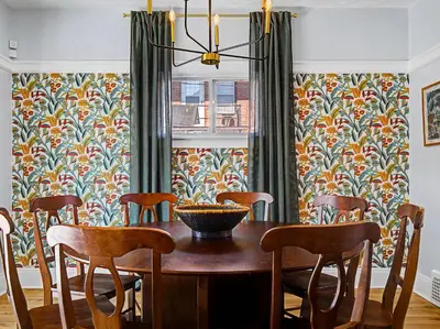 a dining room with a wooden table and chairs at 4 Bed 2 Bath Walk to Lakewood Restaurants and Shops in Lakewood