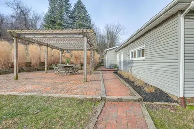 a patio with a picnic table at Patio and Scenic Views Modern Ohio Farmhouse in Bellville
