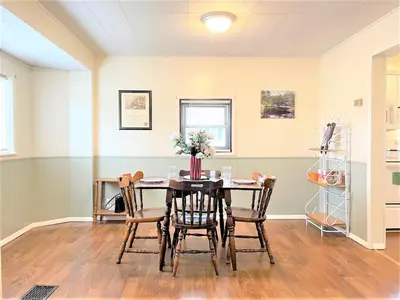 a dining room with a table and chairs at High - Family Neighborhood, Pet Friendly in Van Wert