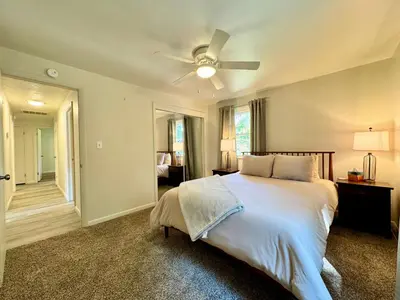 a bedroom with a bed and a ceiling fan at Idle Springs in Marion