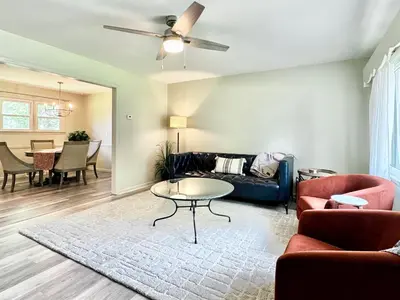 a living room with a couch and a table at The Lime House in Gas City