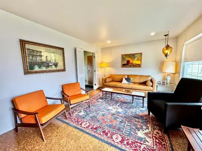 a living room with a couch and two chairs at Retro Refuge On Woodstock Dr in Van Wert