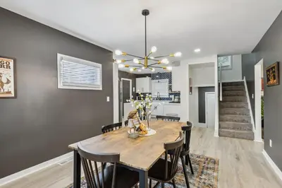 a dining room with a table and chairs at Charming 3BR Home - Close to CLE Clinic in Cleveland Heights