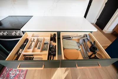 an open drawer filled with tools in a kitchen at Cherry Hollow in McArthur