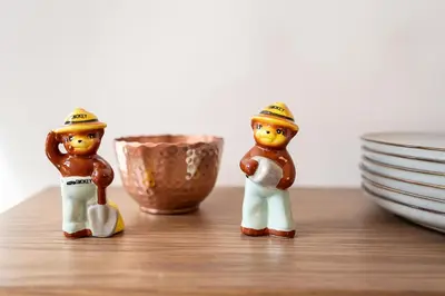 two miniature figurines of a man at Cherry Hollow in McArthur