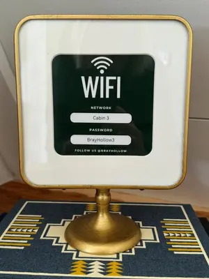 a computer screen with a wifi sign on top of a rug at Hickory Hollow in McArthur