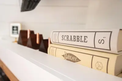 a row of books sitting on a shelf at Oak Hollow in McArthur