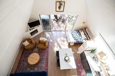 an overhead view of a living room with a rug at Oak Hollow in McArthur