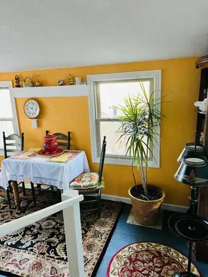 a dining room with a table and a window at Winifreds Hideaway in Berea