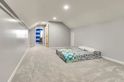 a bedroom with a bed in the middle of a room at Meadow Edges with Yard and Views in Odon in Sunman