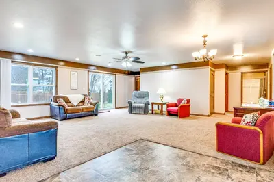 a living room with furniture and a ceiling fan at Meadow Edges with Yard and Views in Odon in Sunman
