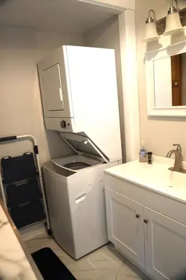 a small kitchen with a sink and a refrigerator at Werner Haus in Sandusky