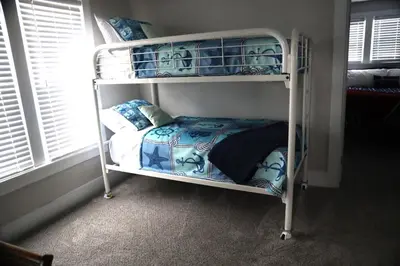 a bunk bed in a room with a bunk bedutenewayangering at Werner Haus in Sandusky