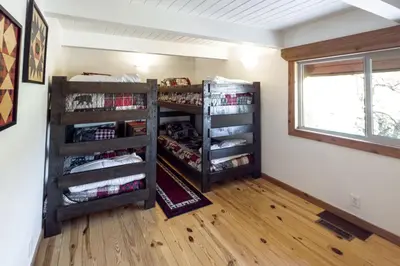 a room with wooden shelves and a window at Cozy Rustic Escape Near Park City Adventures in Defiance