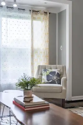 a living room with a couch and a coffee table at Double the Space for Large Groups Entire Duplex in Cleveland