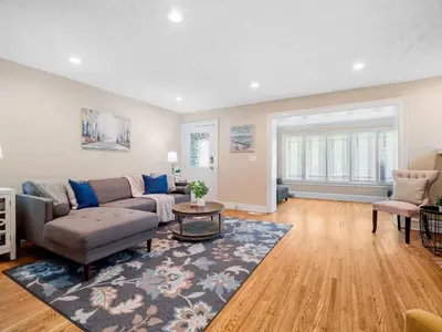 a living room with a couch and a table at Cleveland 3 Bedroom, 10 Mins to Downtown in Cleveland