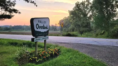 a sign for a motel on the side of a road at Valley Overlook in Peninsula