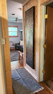 a room with a door with a living room at The Best of Cave Run & Morehead! in Morehead