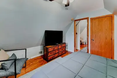 a living room with a flat screen tv and a couch at The Best of Cave Run & Morehead! in Morehead