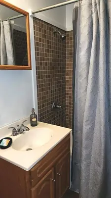 a bathroom with a sink and a shower at The Best of Cave Run & Morehead! in Morehead