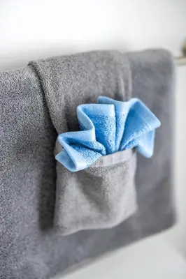 a blue bow tie on a gray shirt at Luxury Downtown Townhome Private Garage Unit 4 in Cleveland