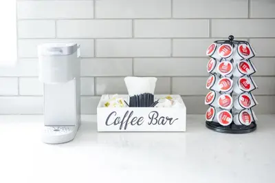 a coffee bar with a box of cupcakes at Luxury Downtown Townhome Private Garage Unit 10 in Cleveland
