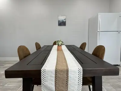 a dining room table with a black and white table cloth at Urban Retreat 2BR Near Downtown in Columbus