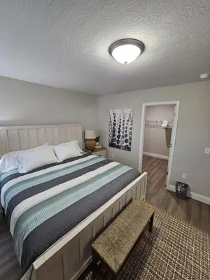 a bedroom with a large bed in a room at Amazing New Wilmington Ranch in Wilmington