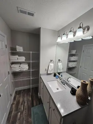a bathroom with a sink and a mirror at Cute New Const Wilmington Ranch in Wilmington