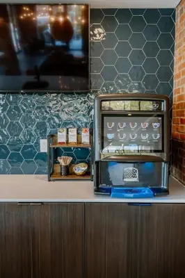 a kitchen counter with a toaster oven on a counter at OTR King Bed Free Parking Gym Top Floor Club Room in Cincinnati