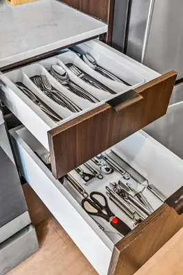 a drawer filled with utensils in a kitchen at OTR King Bed Free On Site Parking Gym Pool Club Room in Cincinnati