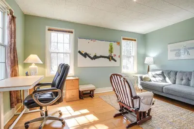 a living room with two chairs and a couch at Spacious and Updated Farmhouse in Yellow Springs in Fairborn