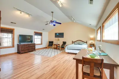 a large bedroom with a bed and a dining table at Quiet and Idyllic Studio Near Glen Helen Preserve in Fairborn