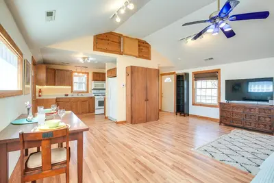 a large kitchen with a table and a ceiling fan at Quiet and Idyllic Studio Near Glen Helen Preserve in Fairborn
