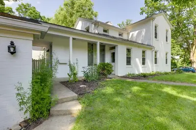 a white house with a yard at Quiet and Idyllic Studio Near Glen Helen Preserve in Fairborn