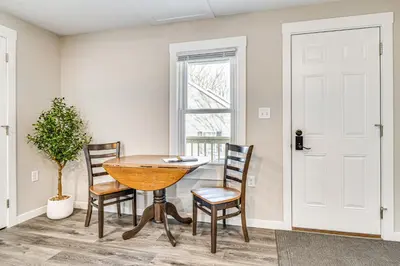 a dining room with a table and two chairs at 15 Mi to Summit Lake State Park Updated Apt! in Hagerstown