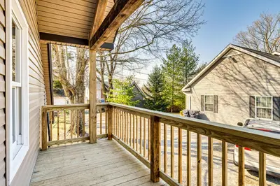a porch of a home with a wooden deck at 15 Mi to Summit Lake State Park Updated Apt! in Hagerstown
