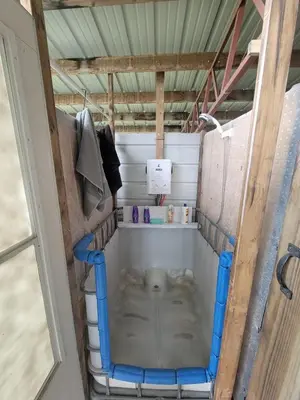 an inside view of a room with an elephant in the middle at Cozy Tiny House on Working Farm, for Fun Glamping Trips in Kentucky in Owenton