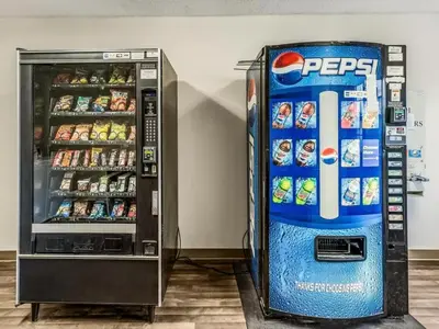 a pepsi vending machine next to a soda machine at Siegel Select Cincinnati Sharonville in Cincinnati