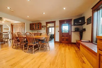 a dining room with a table and chairs at Majestic Home in Hocking wPool Jacuzzi Basketball in McArthur