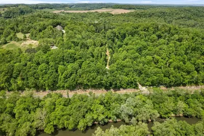 an aerial view of a forest and a river at Unique Dover Accommodation with a Hot Tub Perfect for Glamping in Ohio in Dover