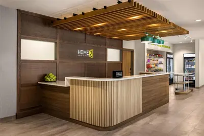a lobby of a home store with a reception counter at Home2 Suites By Hilton Dry Ridge in Dry Ridge