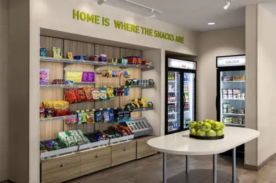 a home is where the snacks are in a store at Home2 Suites By Hilton Dry Ridge in Dry Ridge
