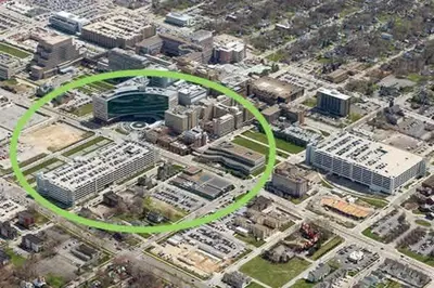 a green circle in a city with buildings at Cle Suites 1BR 1BA 5 min Walk to Cle Clinic Unit 6 in Cleveland