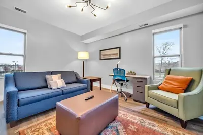 a living room with a couch and two chairs at Cle Suites 1BR 1BA 5 min Walk to Cle Clinic Unit 6 in Cleveland